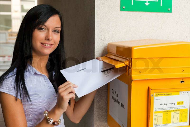 Young woman with a voting card austria, stock photo