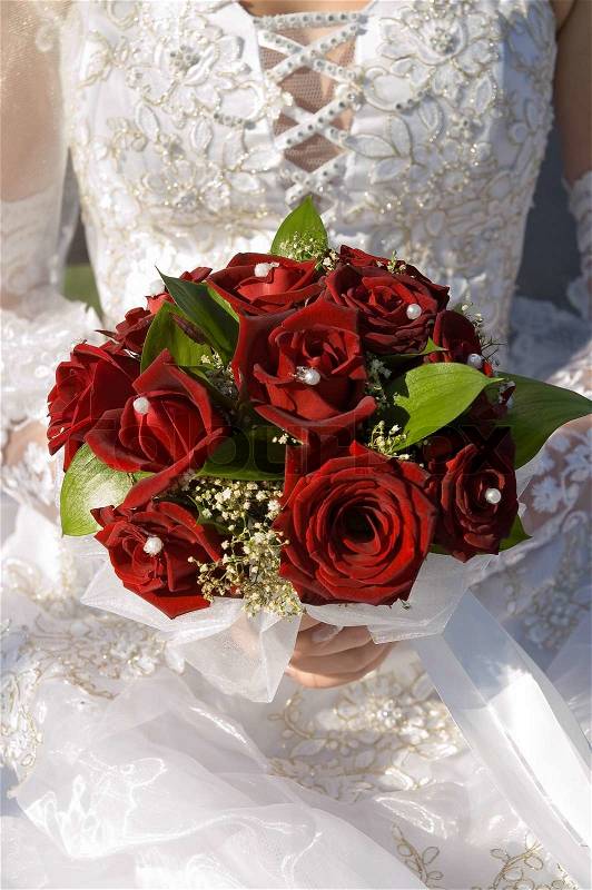 Red fine rose in wedding bouquet, stock photo