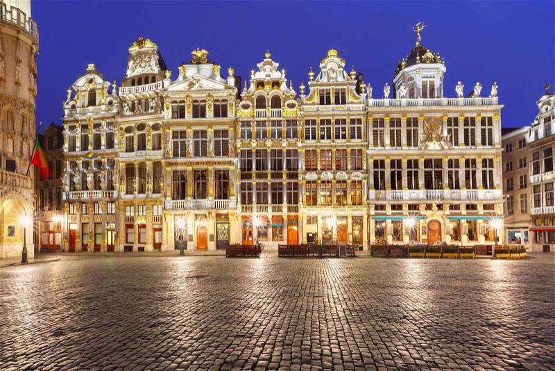 Beautiful houses of the Grand Place Square at night in Belgium, Brussels. From right to left Le Roy d\'Espagne, La Brouette, Le Sac, La Louve, Le Cornet, Le Renard, stock photo