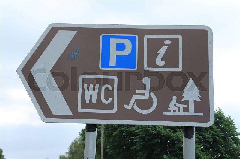 Parking place, information, wc, passable for wheelchair and a picnic place , follow the arrow, stock photo