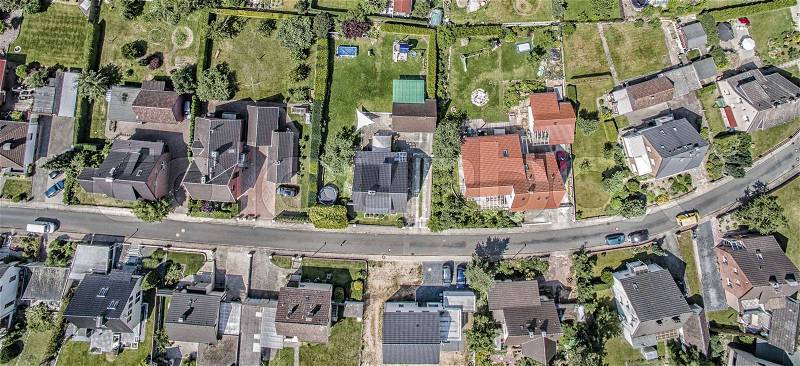 Row of houses on a street in Germany, detached houses with gardens and lawns, aerial photo, stock photo