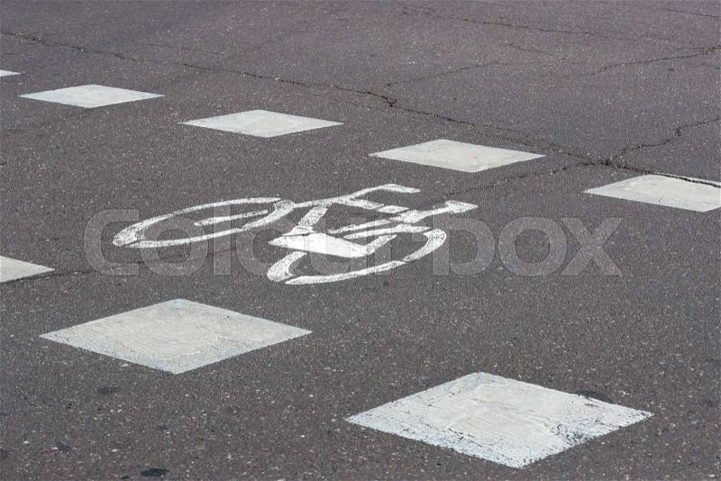 Marking on the bike lane and traffic signs, stock photo