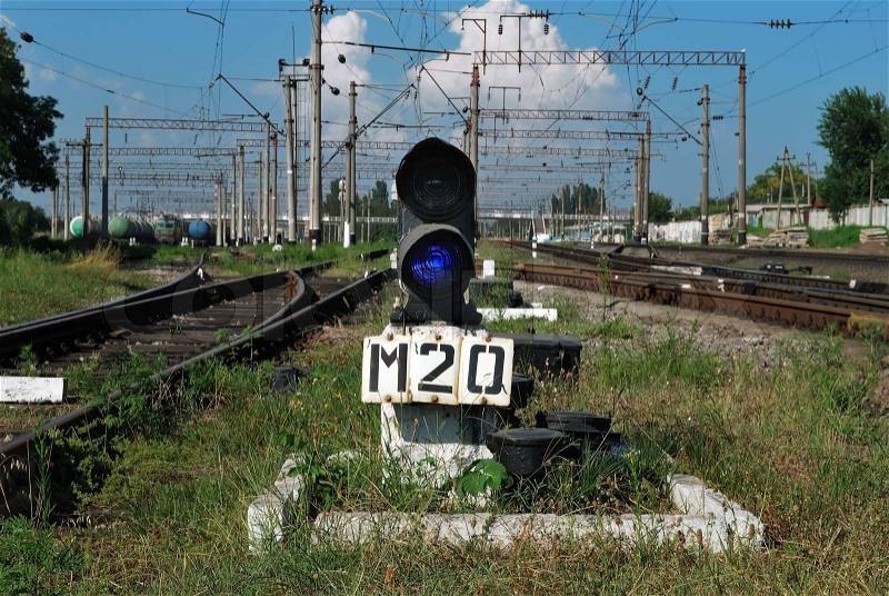 Rail traffic shows a blue light, stock photo