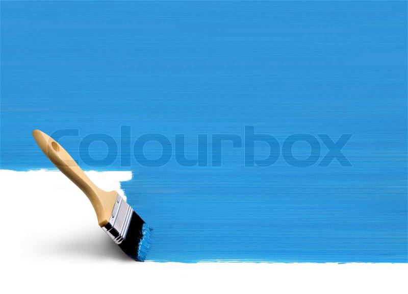 Paint brush painting vertical surface area blue on white background, stock photo