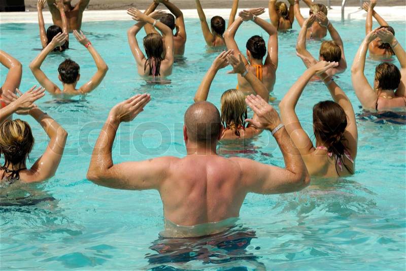 People are doing water aerobic in pool, stock photo