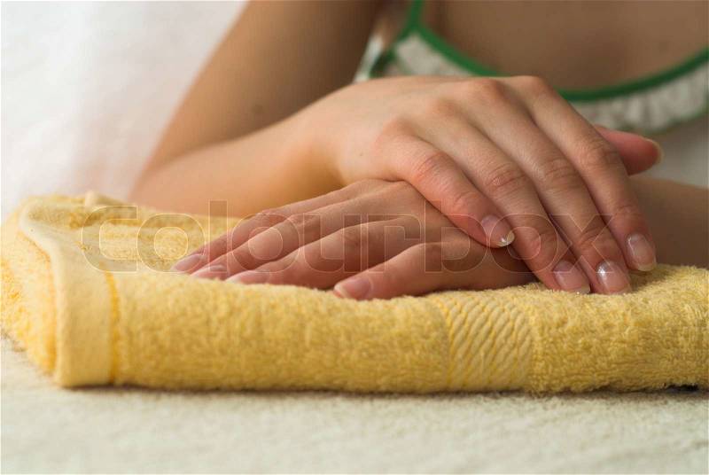 Nice hands on yellow towel, stock photo