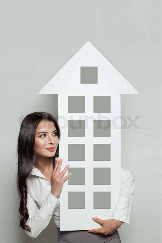 Real estate insurance, protection and property for sale concept. Smiling business woman showing house banner background, stock photo