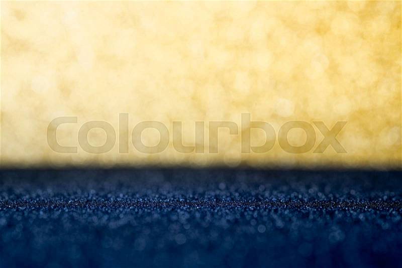 Abstract gold and dark blue sparkling bokeh wall and floor background studio.luxury holiday backdrop mock up for display of product.holiday festive greeting card, stock photo