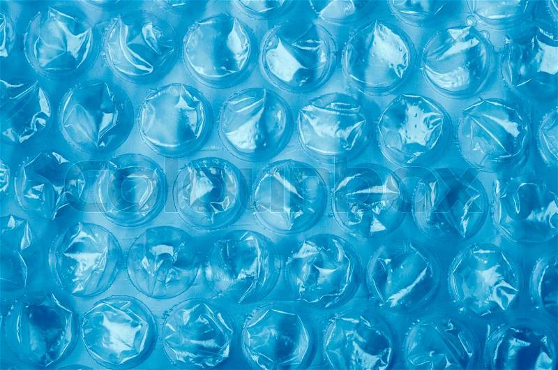 Blue Plastic bubble wrap pattern closeup, stock photo