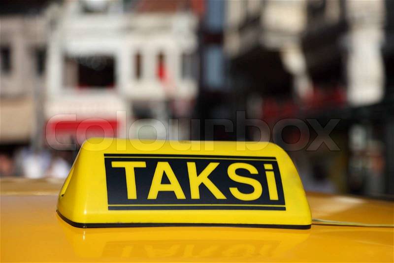 Yellow sign of the Istanbul taxi, Turkey, stock photo