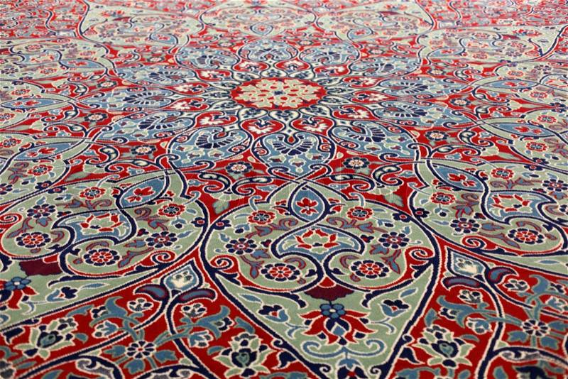 Handmade carpet at the Grand Bazaar in Istanbul, Turkey, stock photo