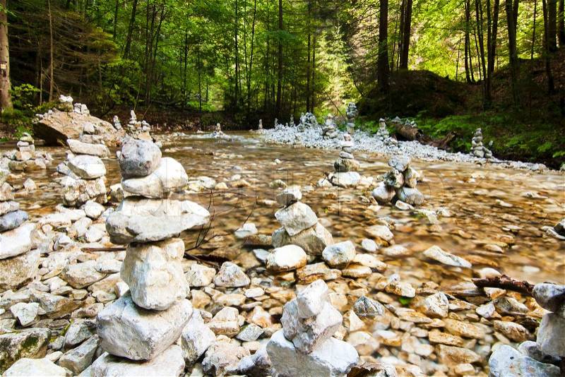 River stream with rocks in forrest, stock photo