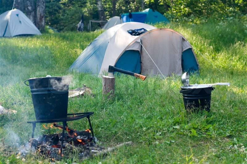 Tent set up for camping in the wood, stock photo