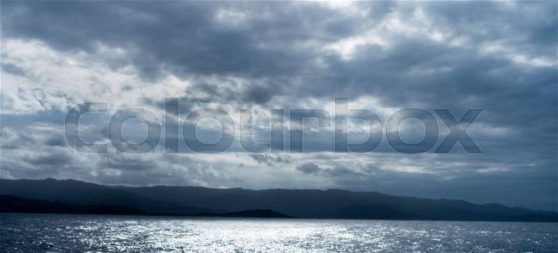 Gloomy cloud mood with sea. icon image for gloomy, scary and threatening, stock photo