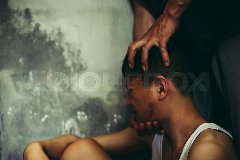 Man hitting a boy on the head,best focus men left arm, hair, Violent criminals with children. concept for stop abusing violence.kidnapping, A fearful child, Human ..., stock photo