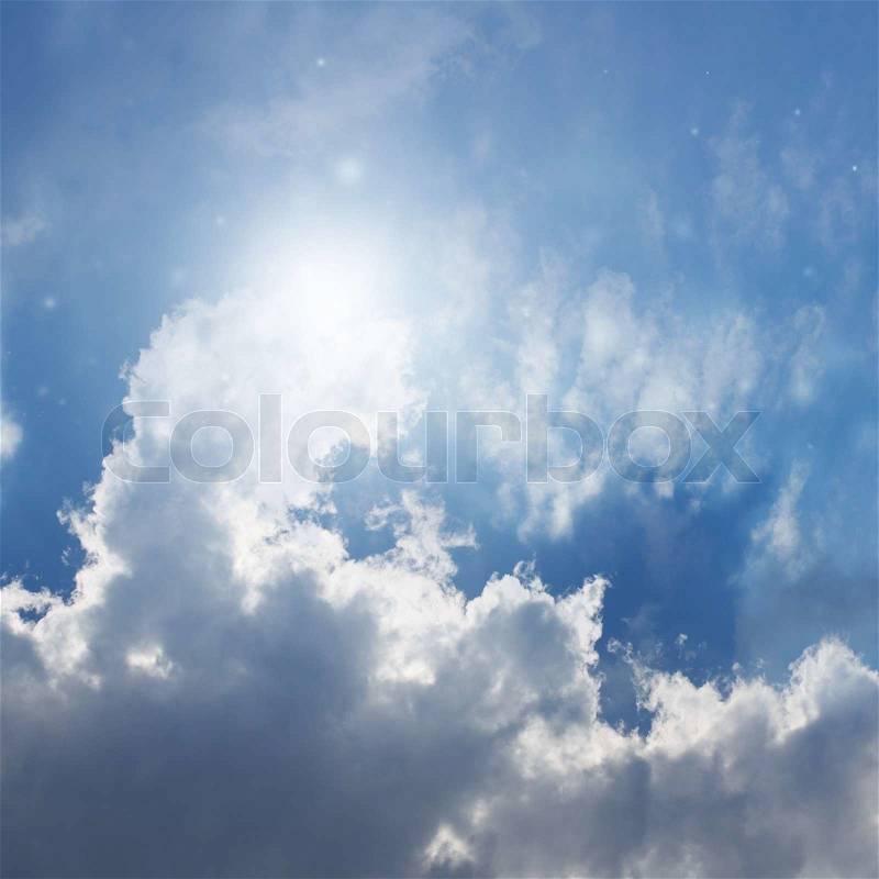 Beautiful peaceful background - bright sun, blue sky and sea, white clouds, stock photo