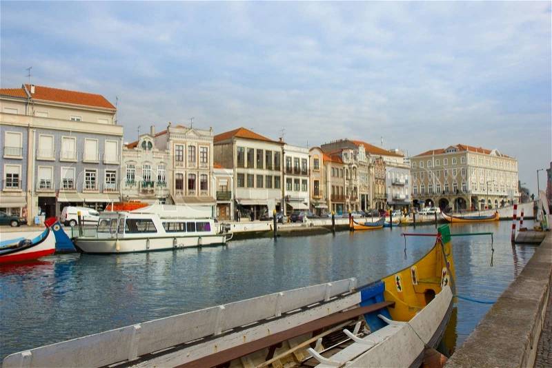 Old street of Aveiro with traditional boats, Portugal, stock photo