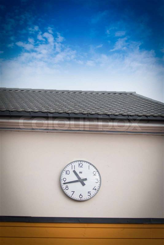School clock on the wall, stock photo