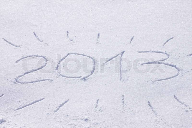 New year 2013 drawn on a snow, stock photo