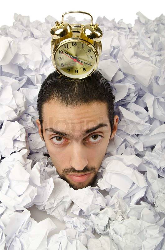 Man with lots of waste paper, stock photo