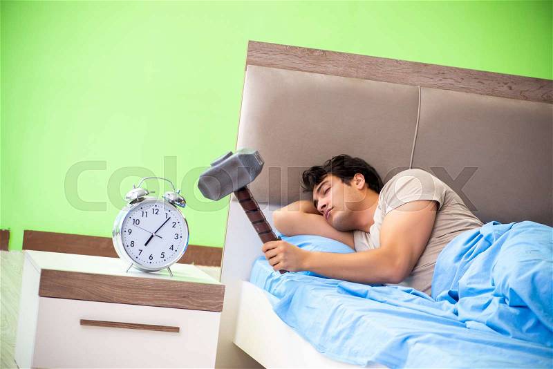 Man having trouble with his sleep, stock photo