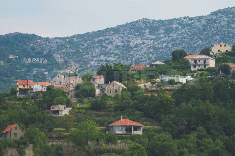Old village built in mountains in Croatia, stock photo