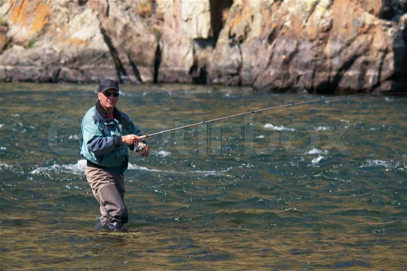 Fly fishing on river Houd in Mongolia, stock photo