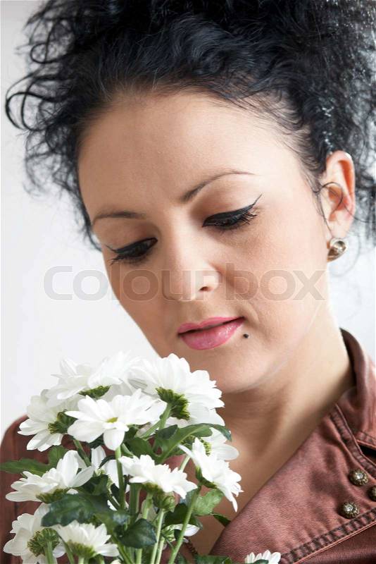 An image of nice woman with flowers, stock photo