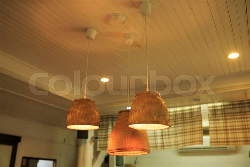 Classic style chandelier lighting decor on ceiling made from bamboo, stock photo