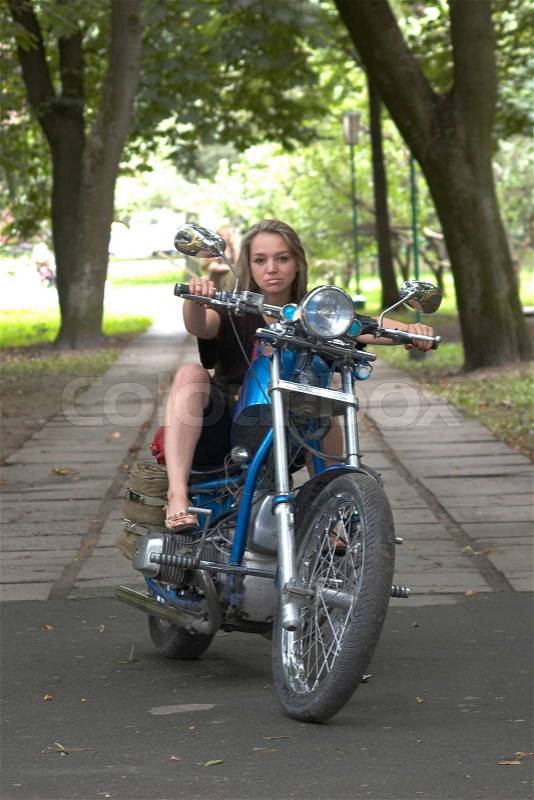 Woman go on a bike, stock photo