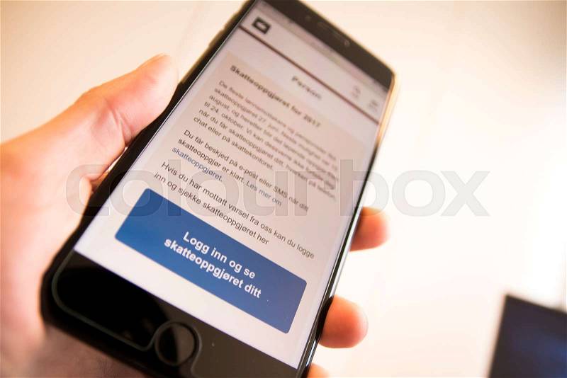 Tax result received on smartphone, stock photo