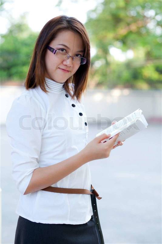 Woman carry book, stock photo
