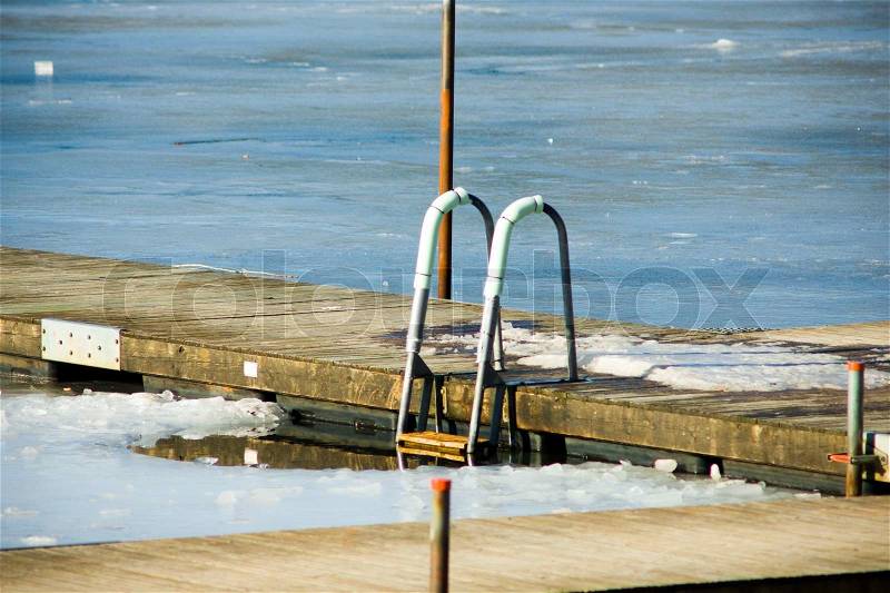 Winter lake to Buffalo, NY pier winter swimming, stock photo