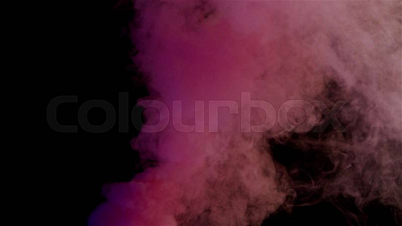 Pink bomb smoke on black background, stock photo