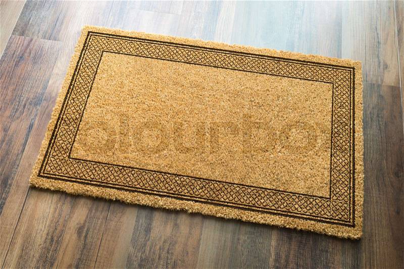 Blank Welcome Mat On Wood Floor Background Ready For Your Own Text, stock photo