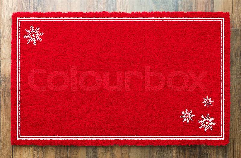 Blank Holiday Red Welcome Mat With Snow Flakes On Wood Floor Background, stock photo