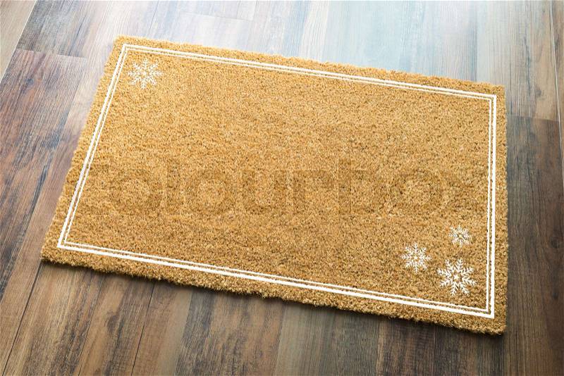 Blank Holiday Welcome Mat With Snow Flakes On Wood Floor Background, stock photo