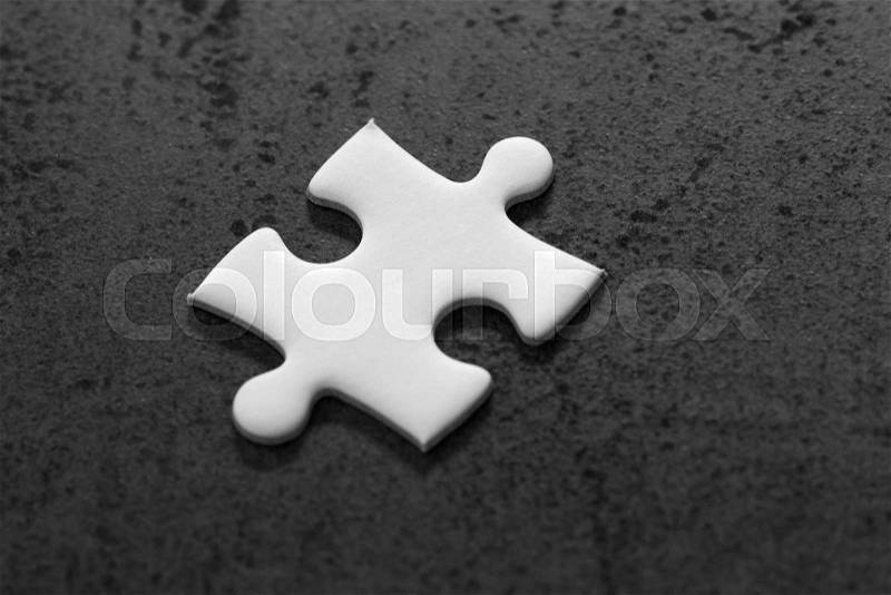 Last missing jigsaw puzzle or uncompleted missing piece, incomplete, unfinished business strategy or finalize, problem solution to success metaphor, stock photo