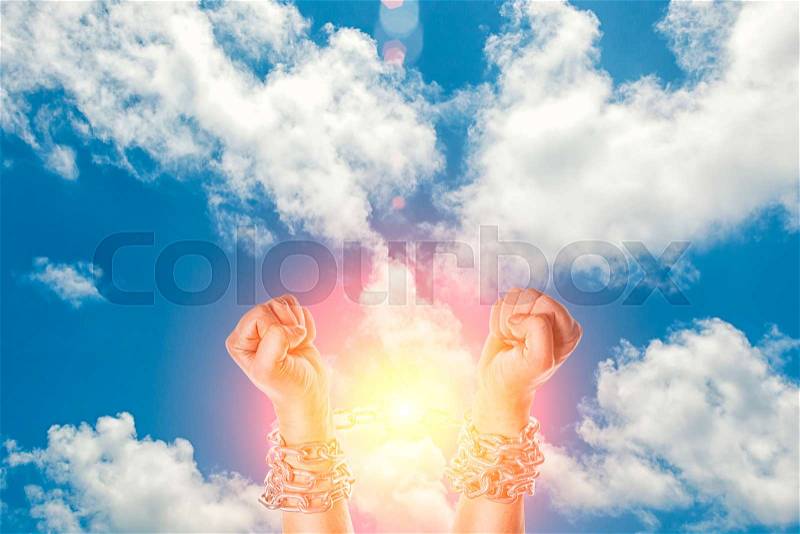 Two hands in chains on a white background, stock photo