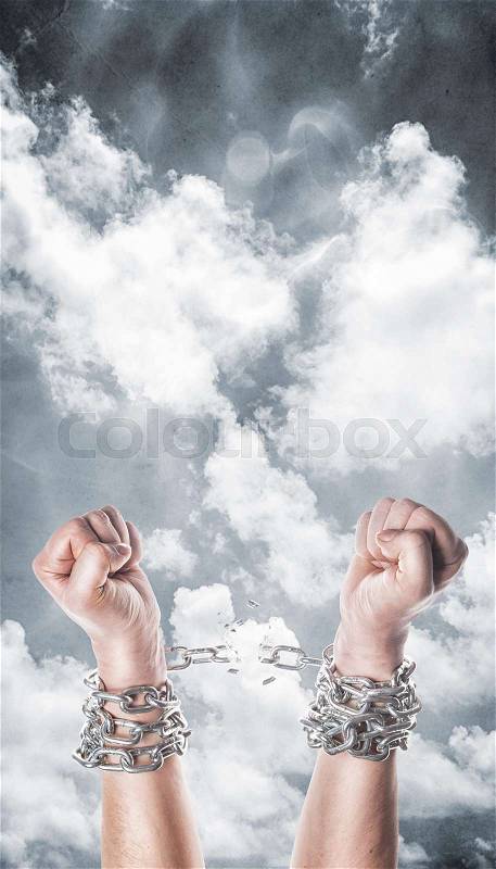 Two hands in chains on a white background, stock photo