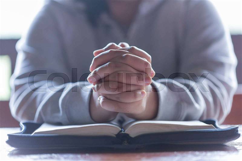 Teenager woman hands praying to god with the bible. Woman Pray for god blessing to wishing have a better life. begging for forgiveness and believe in goodness. ..., stock photo