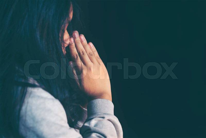 Teen girl hands praying to god with the bible. Girl Pray for god blessing to wishing have a better life. begging for forgiveness and believe in goodness. Christian ..., stock photo