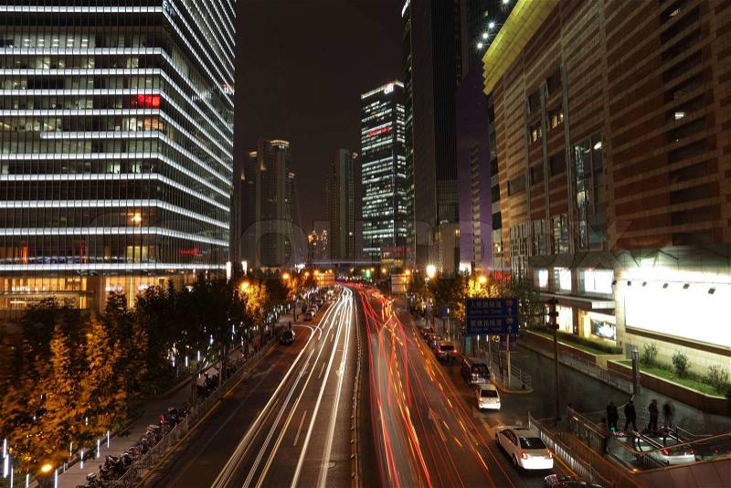 Street in Pudong at night, Shanghai China, stock photo