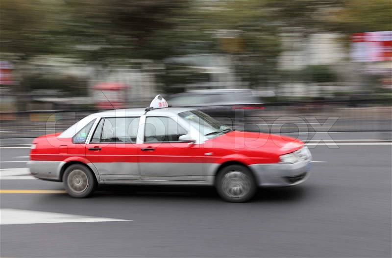 Taxi in the street of Shanghai, China With motion blur, stock photo