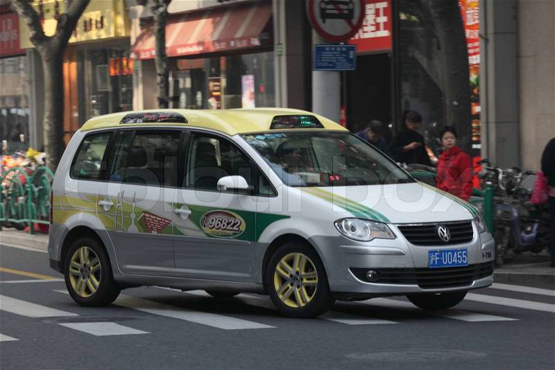 Volkswagen Touran Taxi in Shanghai, China Photo taken at 20th of November 2010, stock photo
