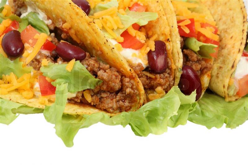 Mexican tacos isolated over white background, stock photo