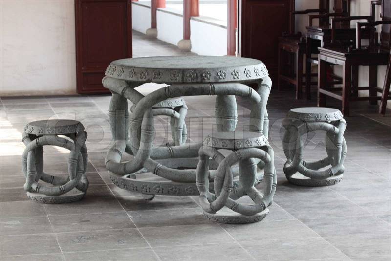 Ancient stone table and chairs in Chinese Temple, Shanghai, stock photo