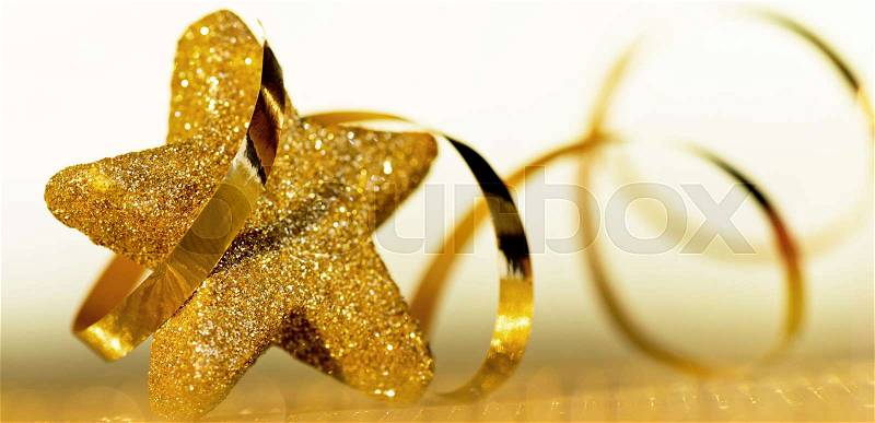 Christmas background. Christmas star with a ribbon, stock photo