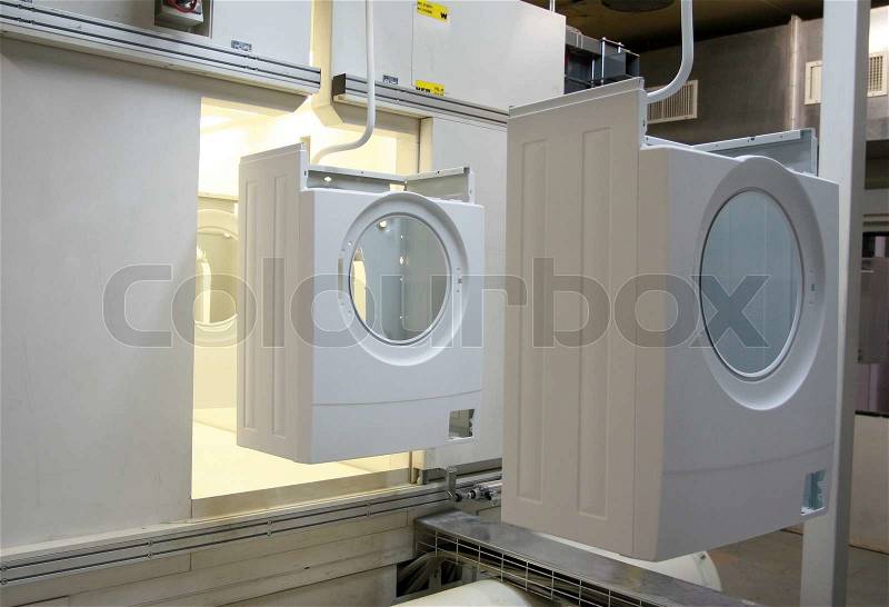 Production of washing machines, stock photo