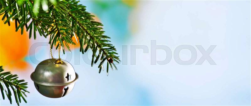 Christmas Bell with Christmas Twig on the Unfocused Background, stock photo